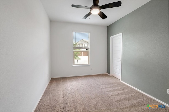 4648 Padula Dr, Round Rock, TX 78665 - carpeted spare room featuring a ceiling fan and baseboards