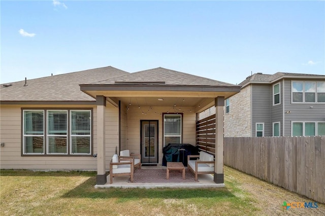 4648 Padula Dr, Round Rock, TX 78665 - rear view of property with a patio and a shingled roof