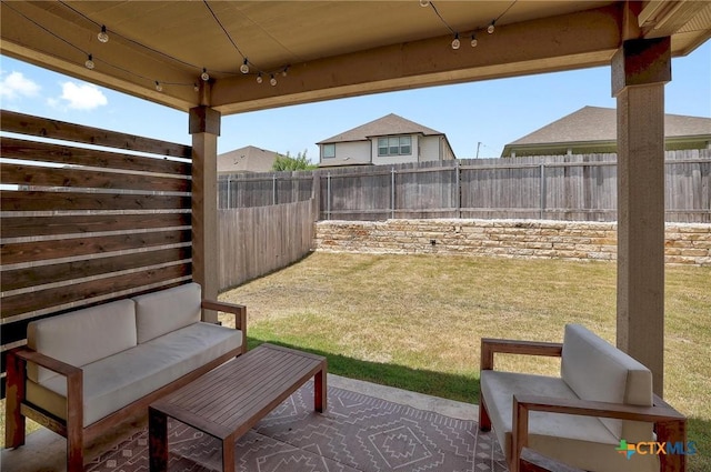 4648 Padula Dr, Round Rock, TX 78665 - fenced backyard with an outdoor living space and a patio area