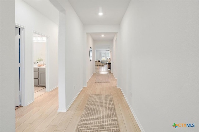 4648 Padula Dr, Round Rock, TX 78665 - corridor featuring light wood-style floors and recessed lighting