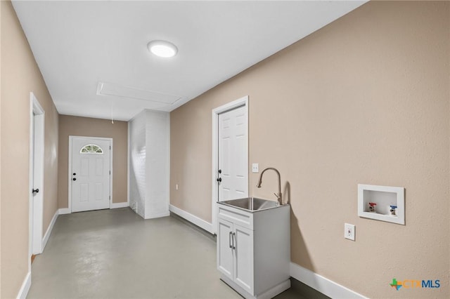 454 W Ward St, Goliad, TX 77963 - washroom featuring attic access and washer hookup