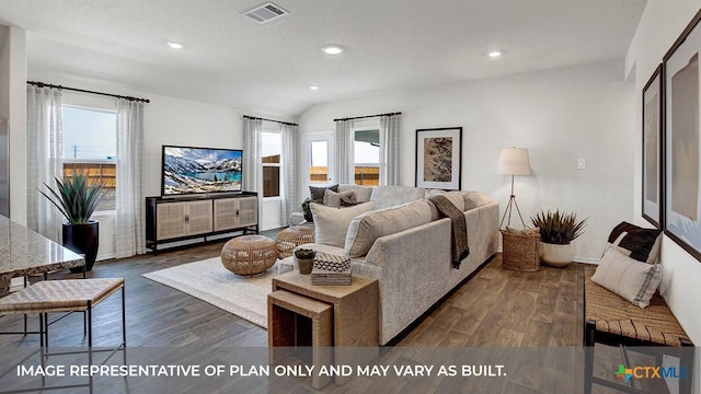1000 Village Run, Seguin, TX 78155 - living area with recessed lighting and dark wood-style floors