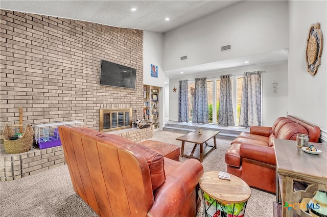 living room featuring light carpet, brick wall, a textured ceiling, high vaulted ceiling, and a fireplace