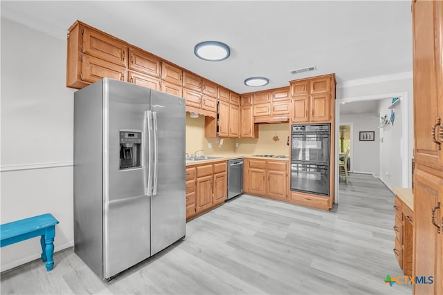 kitchen with stainless steel appliances, sink, light wood-type flooring, and ornamental molding