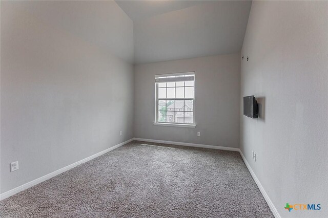 1233 Jester Ct, Copperas Cove, TX 76522 - unfurnished room with baseboards, vaulted ceiling, and carpet