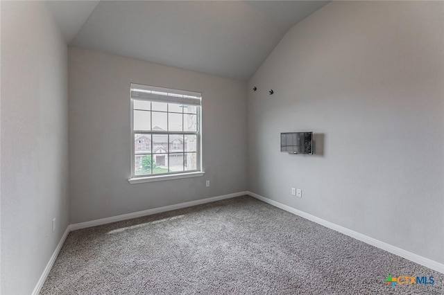 1233 Jester Ct, Copperas Cove, TX 76522 - carpeted empty room with baseboards and lofted ceiling