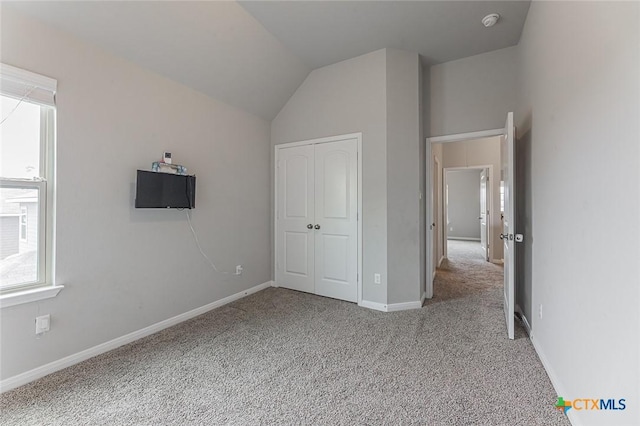 1233 Jester Ct, Copperas Cove, TX 76522 - unfurnished bedroom featuring vaulted ceiling, a closet, baseboards, and carpet flooring