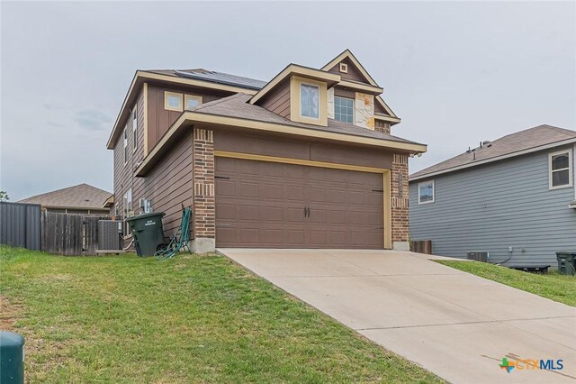 1233 Jester Ct, Copperas Cove, TX 76522 - view of front of property with driveway, a garage, fence, cooling unit, and a front lawn
