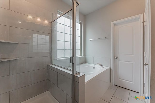 1233 Jester Ct, Copperas Cove, TX 76522 - full bathroom with a garden tub, tile patterned floors, and a shower stall
