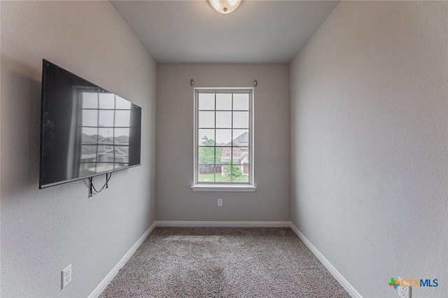 1233 Jester Ct, Copperas Cove, TX 76522 - empty room featuring carpet flooring, baseboards, and a textured wall