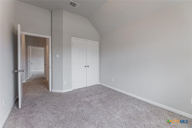 1233 Jester Ct, Copperas Cove, TX 76522 - unfurnished bedroom featuring visible vents, baseboards, carpet, and lofted ceiling