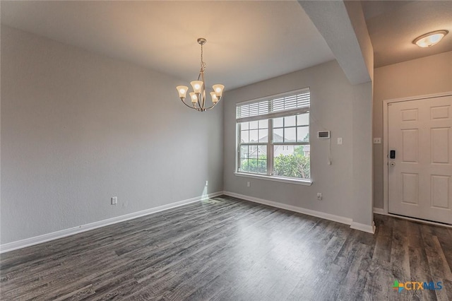 1233 Jester Ct, Copperas Cove, TX 76522 - foyer entrance with baseboards, dark wood finished floors, and a chandelier