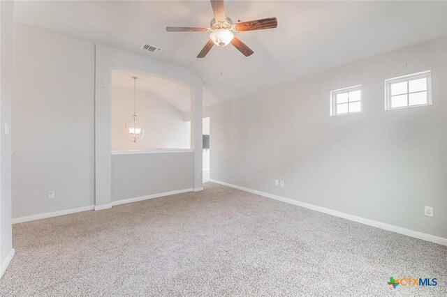 1233 Jester Ct, Copperas Cove, TX 76522 - carpeted empty room featuring visible vents, baseboards, ceiling fan, and lofted ceiling
