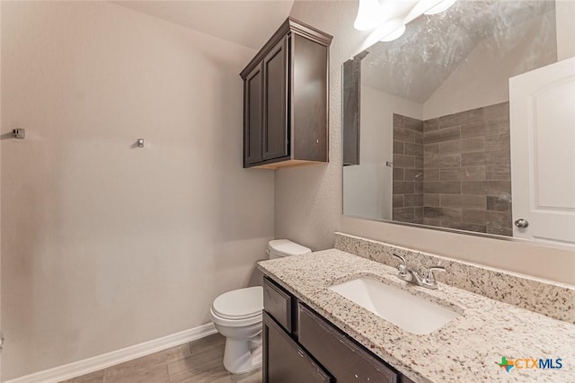 1233 Jester Ct, Copperas Cove, TX 76522 - bathroom featuring vanity, baseboards, and toilet