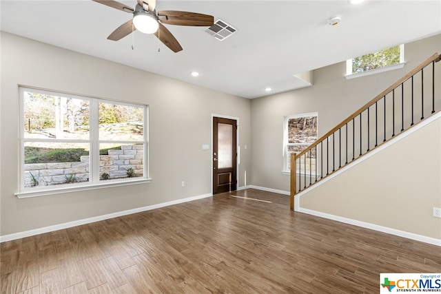 entrance foyer with dark hardwood / wood-style floors and ceiling fan