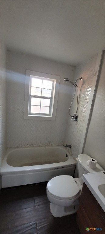 full bathroom featuring vanity, toilet, and washtub / shower combination