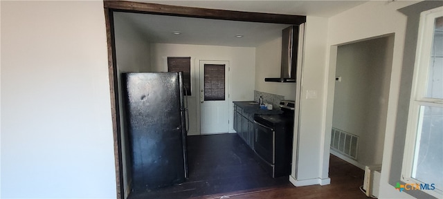 kitchen featuring sink and black appliances