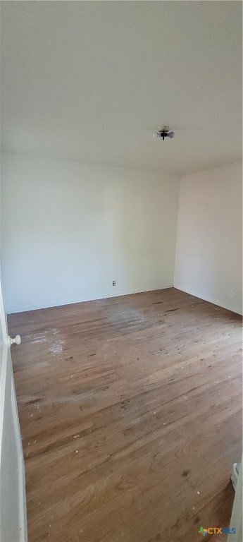 spare room with light wood-type flooring