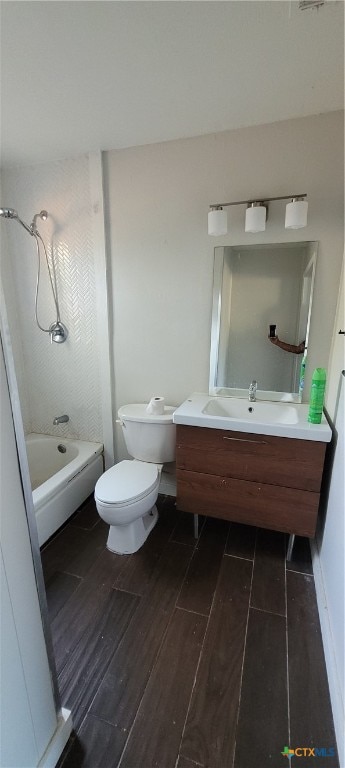 full bathroom with vanity, hardwood / wood-style floors, toilet, and tub / shower combination