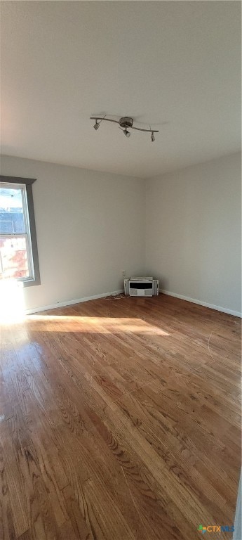 empty room featuring hardwood / wood-style floors