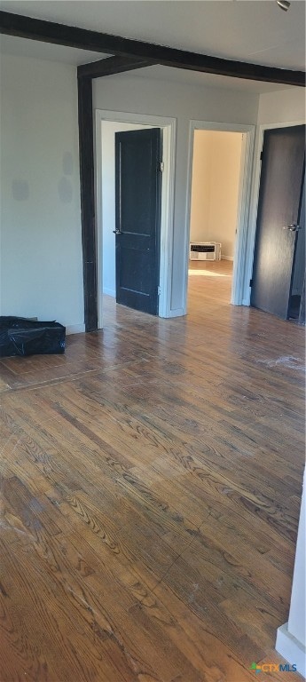 empty room featuring dark hardwood / wood-style floors