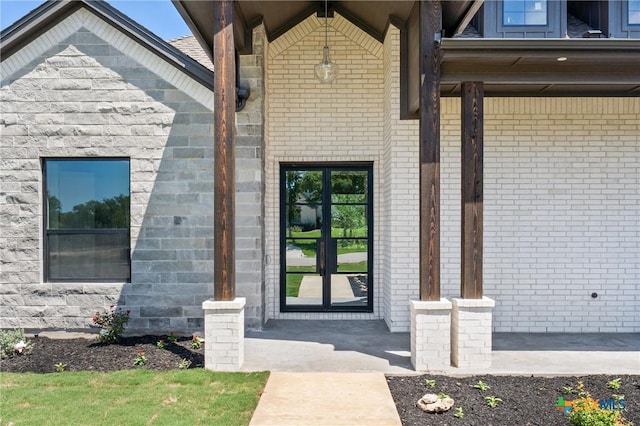 644 Creekside Dr, Belton, TX 76513 - property entrance featuring brick siding and french doors