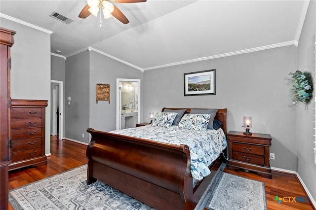 bedroom featuring ornamental molding, dark wood-type flooring, connected bathroom, and ceiling fan