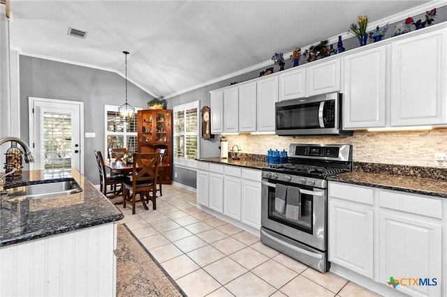 kitchen featuring white cabinetry, sink, and stainless steel appliances