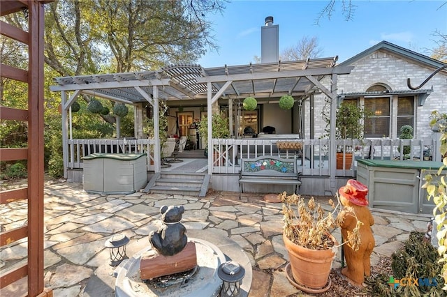 view of patio / terrace with a porch and a pergola