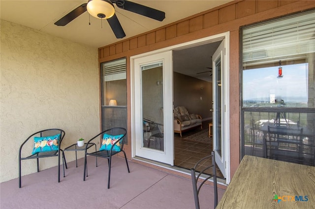 exterior space featuring a patio and ceiling fan