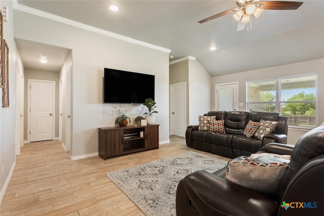 living room with light hardwood / wood-style floors, ceiling fan, vaulted ceiling, and ornamental molding