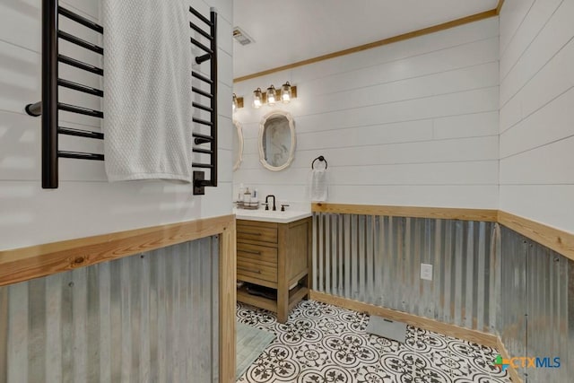 bathroom with visible vents and vanity