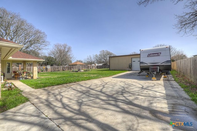 view of yard with a fenced backyard