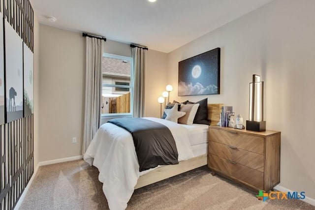 bedroom featuring carpet flooring