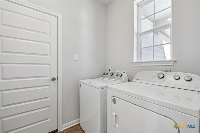 laundry area with washing machine and dryer