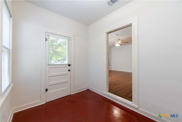 entryway with ceiling fan and dark hardwood / wood-style floors