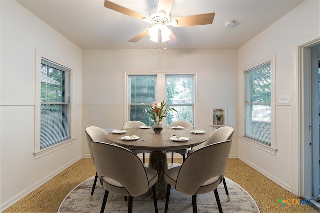 dining area with ceiling fan