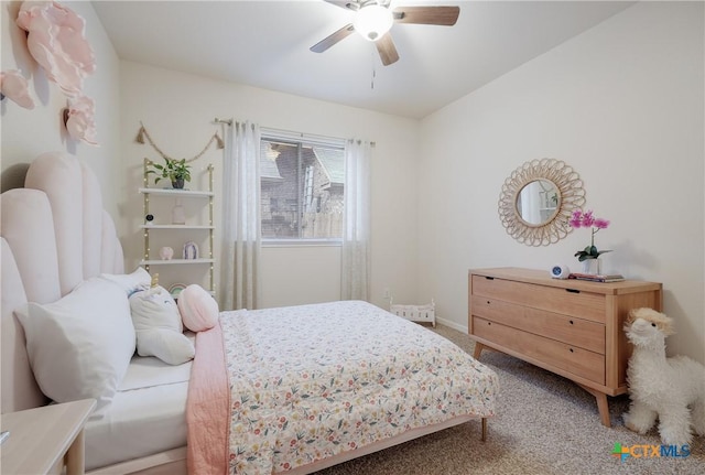 carpeted bedroom featuring ceiling fan