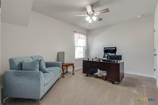 carpeted office with ceiling fan