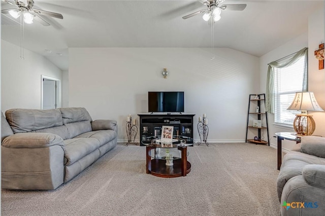 carpeted living room with vaulted ceiling and ceiling fan