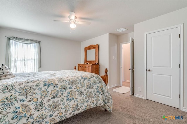 carpeted bedroom with ceiling fan