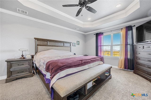 1211 Liberation Ln, Copperas Cove, TX 76522 - bedroom featuring a raised ceiling, light carpet, crown molding, ceiling fan, and recessed lighting