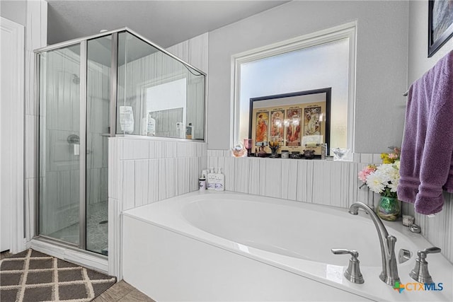 1211 Liberation Ln, Copperas Cove, TX 76522 - bathroom featuring a shower stall and a bath