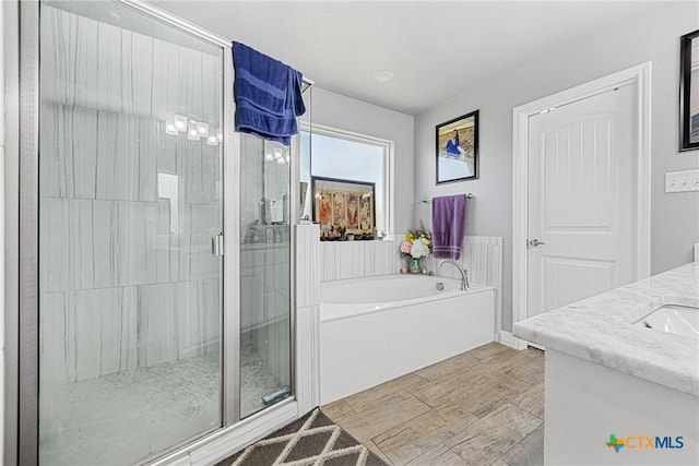 1211 Liberation Ln, Copperas Cove, TX 76522 - bathroom with a bath, a shower stall, and vanity