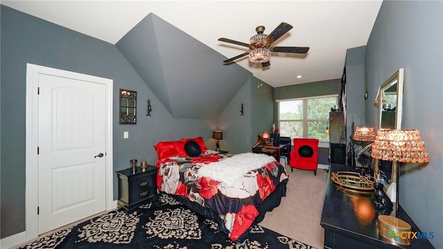 bedroom with carpet floors, baseboards, ceiling fan, and lofted ceiling