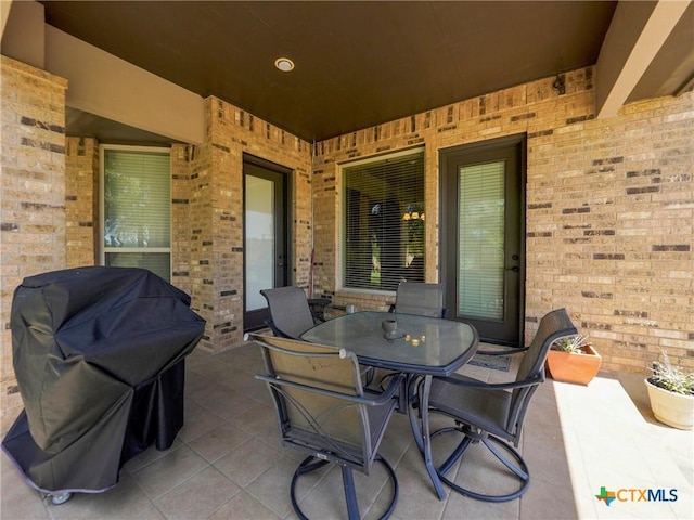 view of patio featuring outdoor dining space and area for grilling