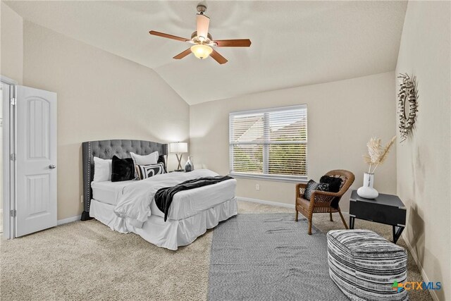 834 Wall St, New Braunfels, TX 78130 - carpeted bedroom with baseboards, lofted ceiling, and a ceiling fan