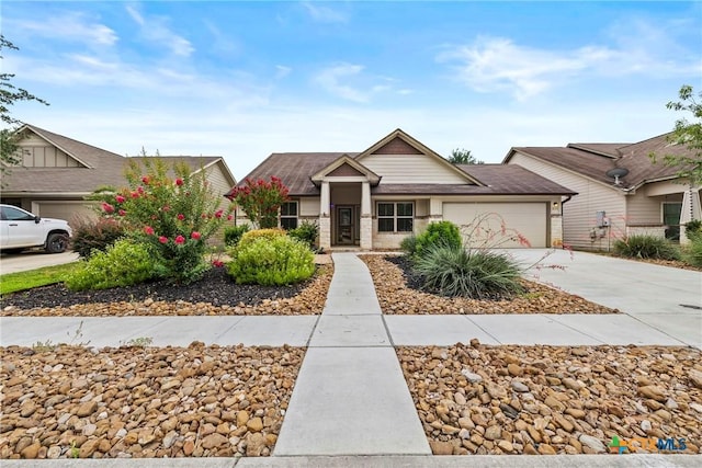 834 Wall St, New Braunfels, TX 78130 - view of front of property with an attached garage and driveway
