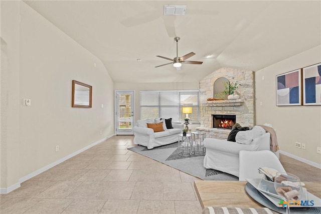 834 Wall St, New Braunfels, TX 78130 - living room with vaulted ceiling, a ceiling fan, a fireplace, and baseboards