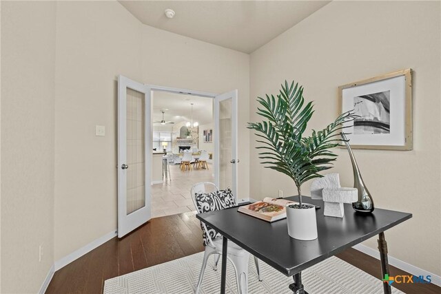 834 Wall St, New Braunfels, TX 78130 - office space with french doors, baseboards, and wood finished floors